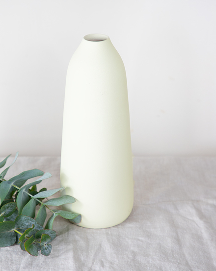 Pale yellow ceramic vase