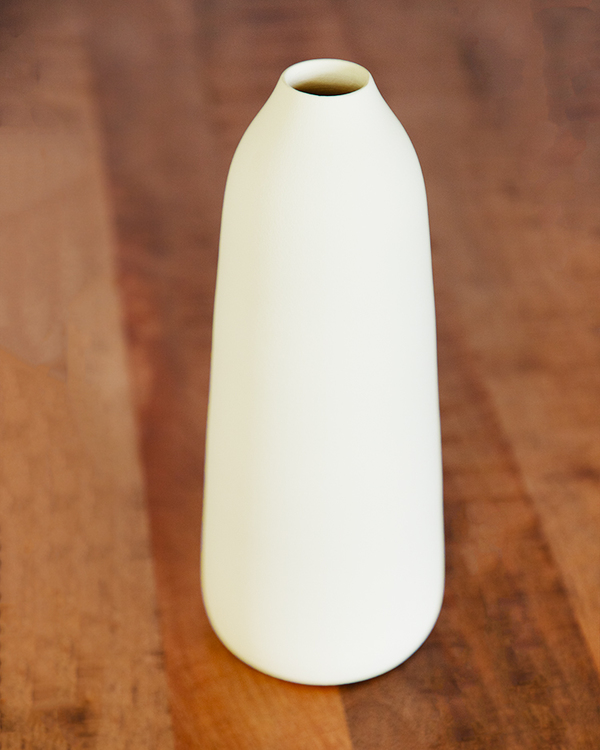 Pale yellow ceramic vase